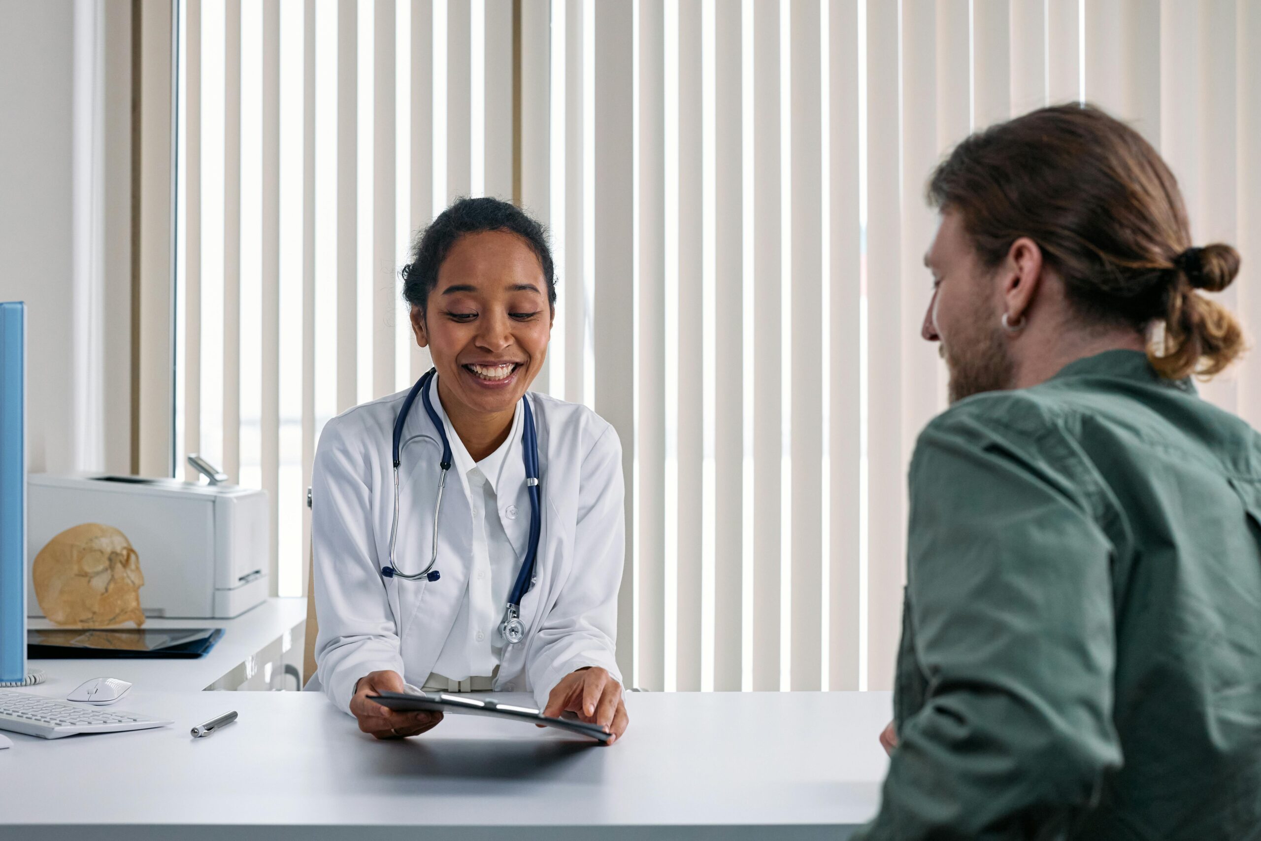 A patient speaking to a doctor A patient speaking to a doctor